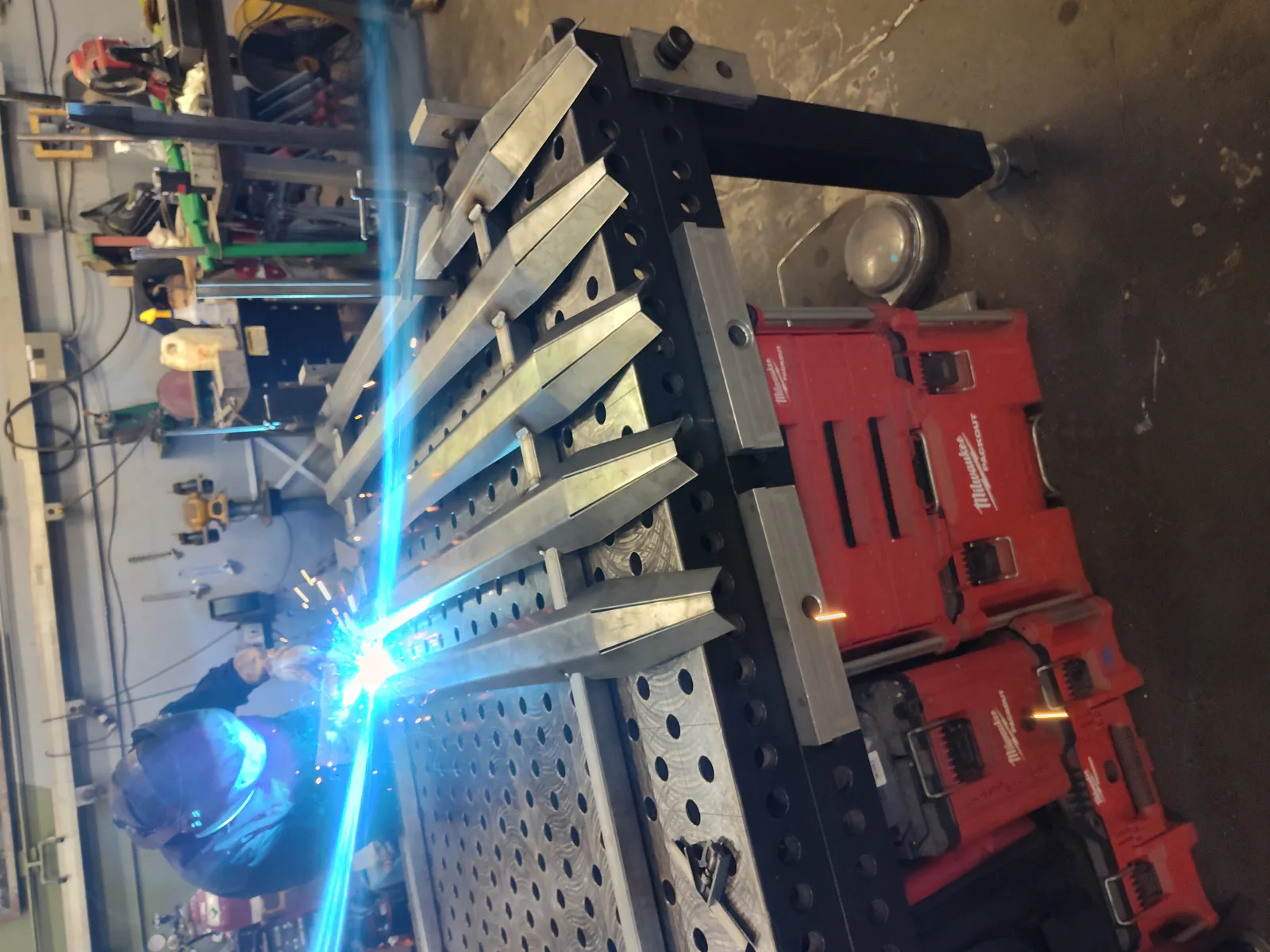 A fabricator welding the original CastleSpan steel panel